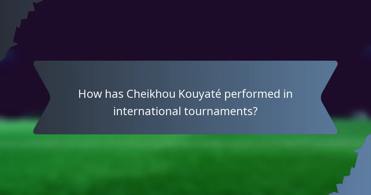 How has Cheikhou Kouyaté performed in international tournaments?